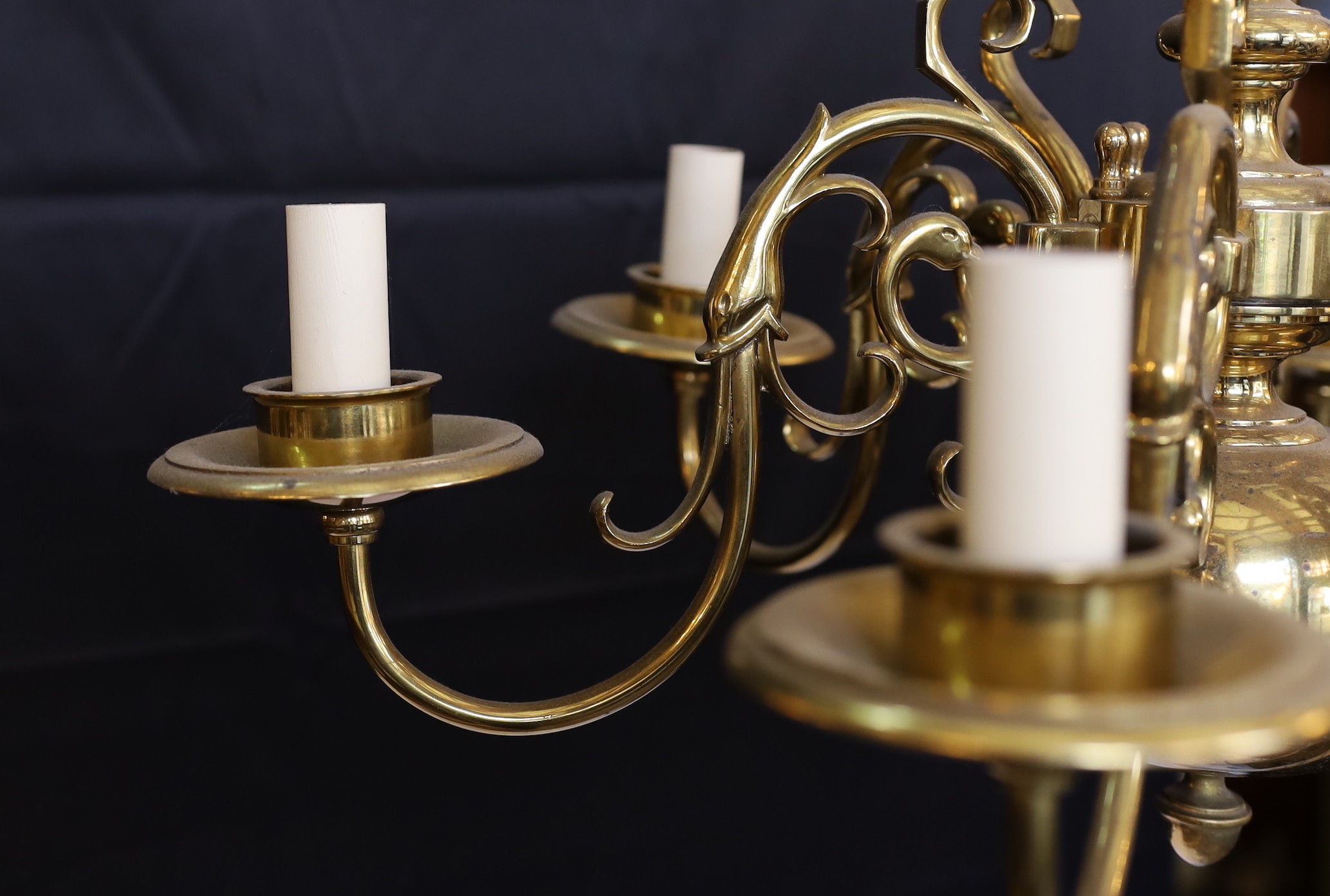 A pair of Dutch 17th century style lacquered bronze six light chandeliers, height 50cm. width 60cm